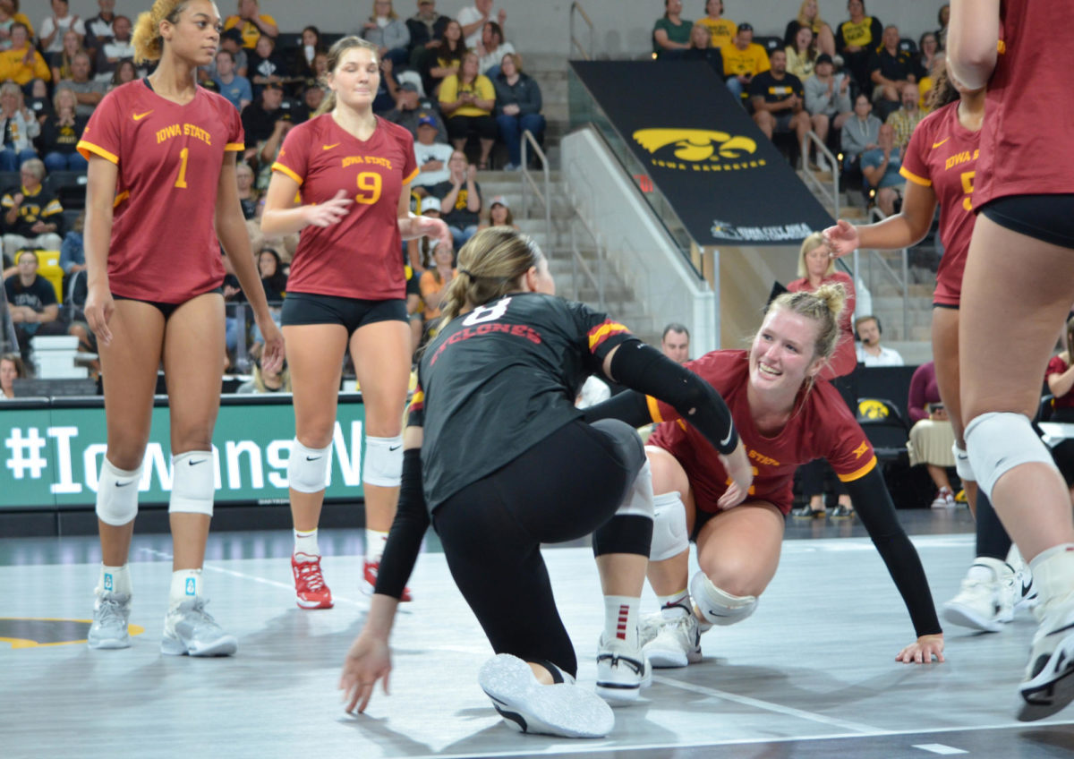 Iowa State University volleyball players between plays during the game against the University of Iowa on Wednesday, Sept. 6, 2023.
