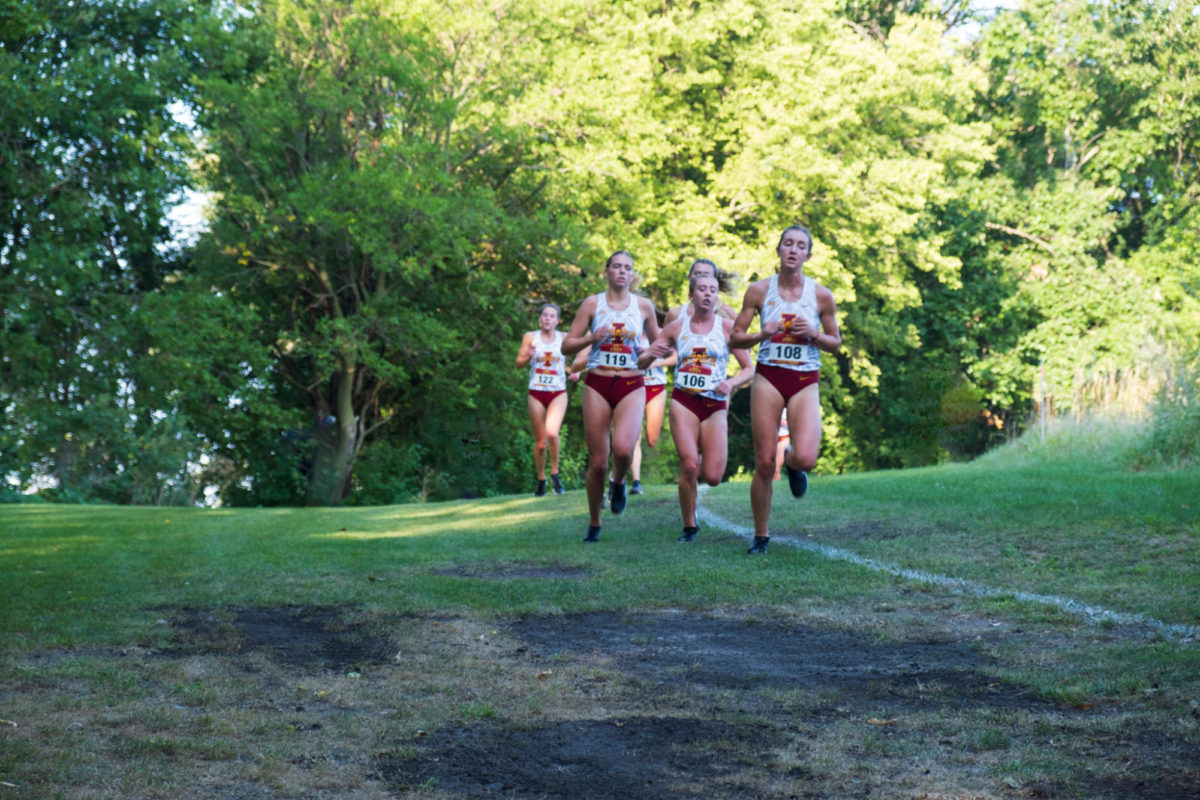 Iowa State womens cross-country team running in a pack at the two-mile mark during the Cyclone Preview, Iowa State University Cross Country Course, Ames, Iowa, Sept. 1, 2023.