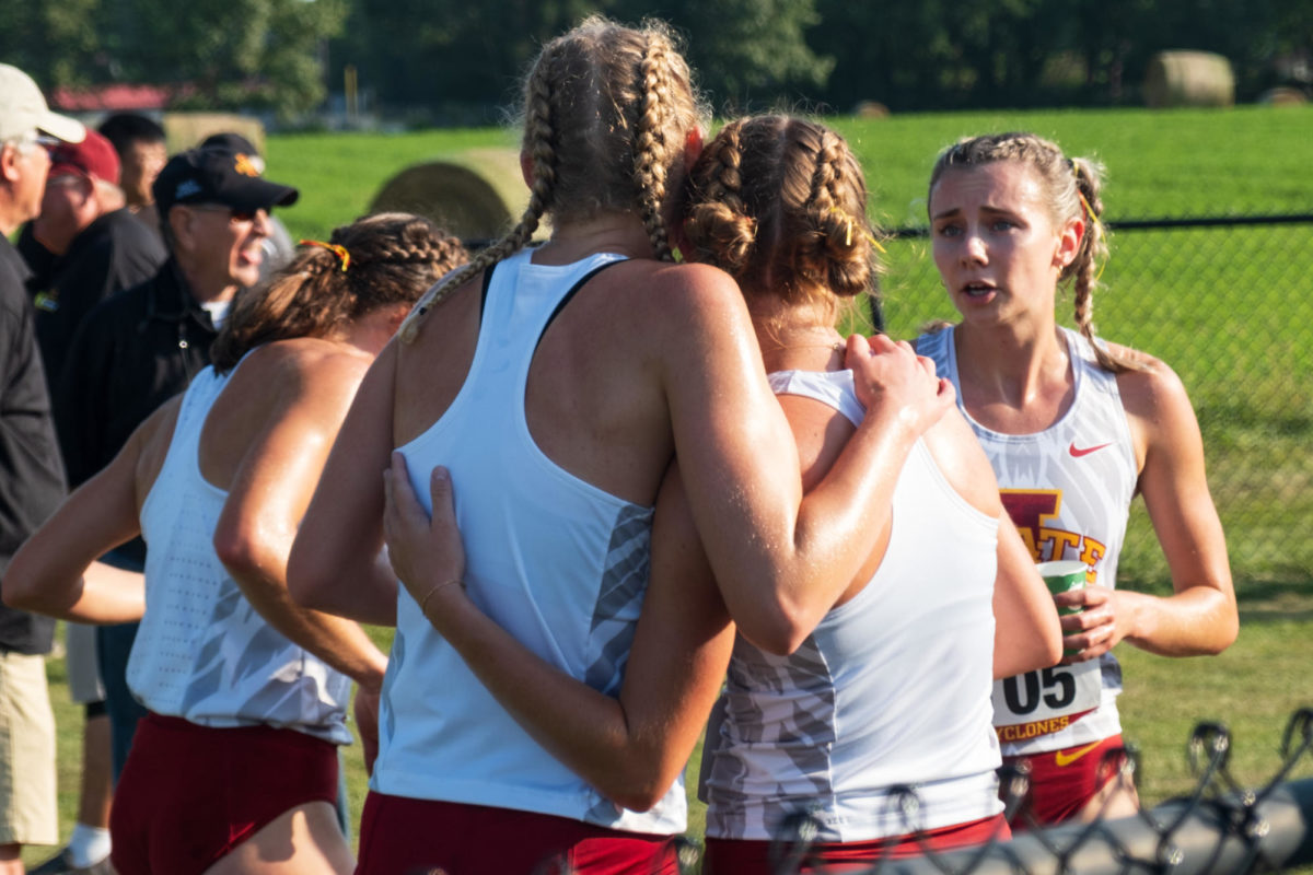 Iowa State womens cross country team hug after finishing their event at the Cyclone Preview at the Iowa State University Cross Country Course in Ames, Iowa, Sept. 1, 2023.