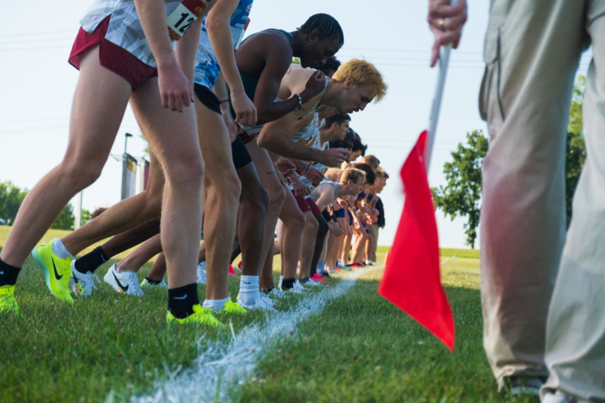 Runners on the line moments before the Cyclone Preview at the Iowa State University Cross Country Course in Ames, Iowa, Sept. 1, 2023.