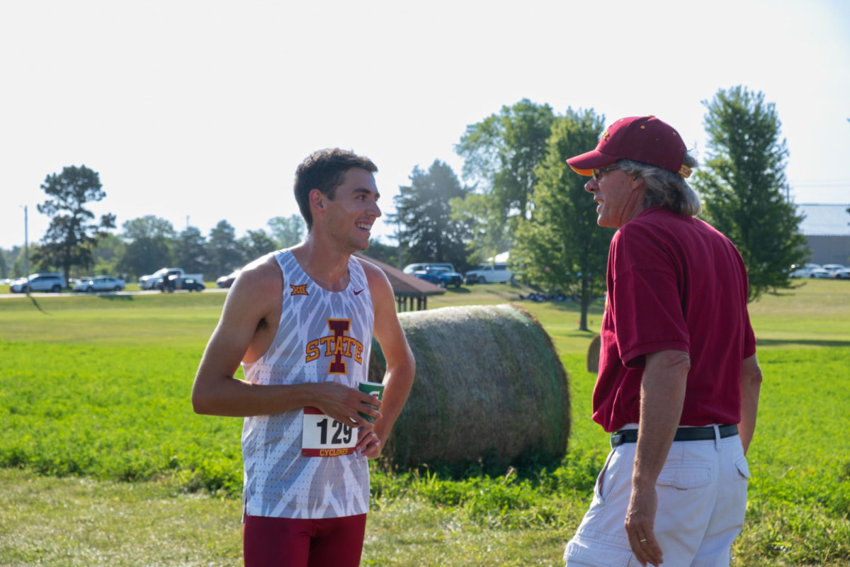 Silas Winders talking with coach after the Cyclone Preview on Sept. 1, 2023.