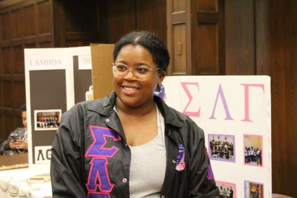 Gabriella Comstock discusses the Sigma Lambda Gamma sorority to attendees during Meet The Greeks at the Memorial Union on Sept. 6, 2023. 
