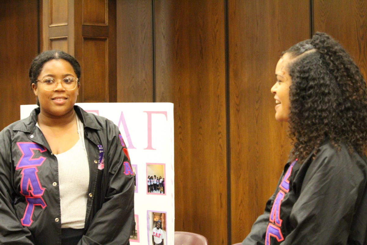 Gabrielle Comstock, and Tiaunna Little pitch their sororitys academic history to attendees of Meet the Greeks in the South Ballroom of Memorial Union on Sept. 6, 2023. 