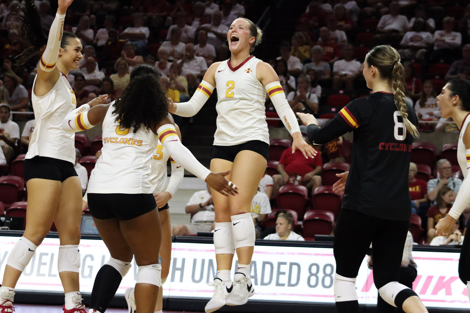 The Cyclones celebrate after a point is scored against Baylor at Hilton Coliseum on Sept. 30, 2023. 
 