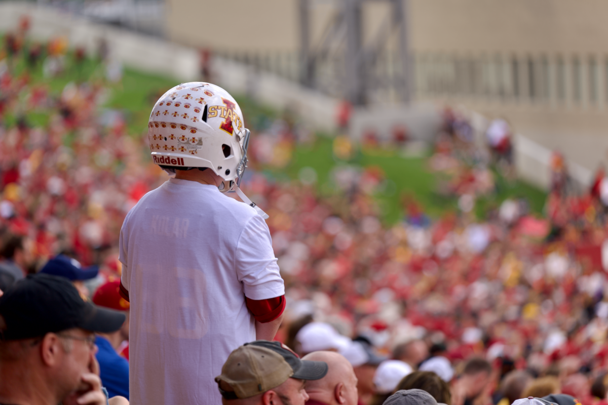 A young Iowa State fan watching the Cyclones play from the stands in Jack Trice Stadium on Sept. 23, 2023.