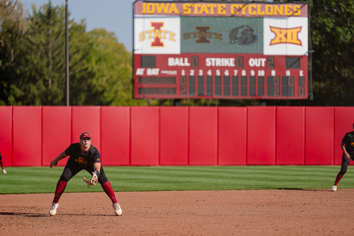 Ashley Minor on her toes as the Drake batter makes contact during the Drake vs. Iowa State match on Sept. 29, 2023.