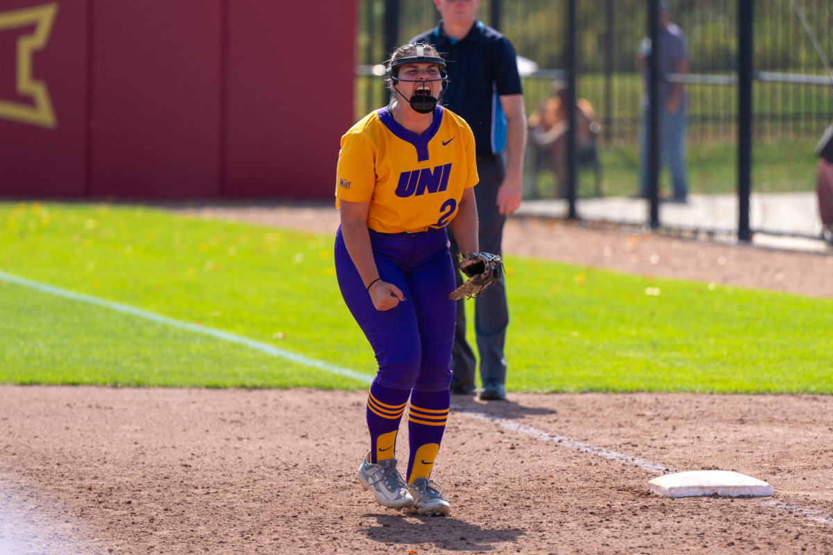 UNI player Samantha Heyer screaming in joy as the Drake player at bat strikes out wining UNI the game on Sept. 30, 2023.