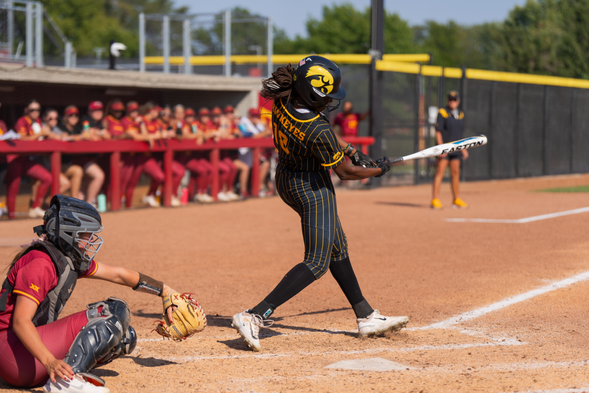 Jalen Adams of the Iowa Hawkeyes swings and misses for a strike against Iowa State on Sept. 30, 2023 at the Cyclone Sports Complex.