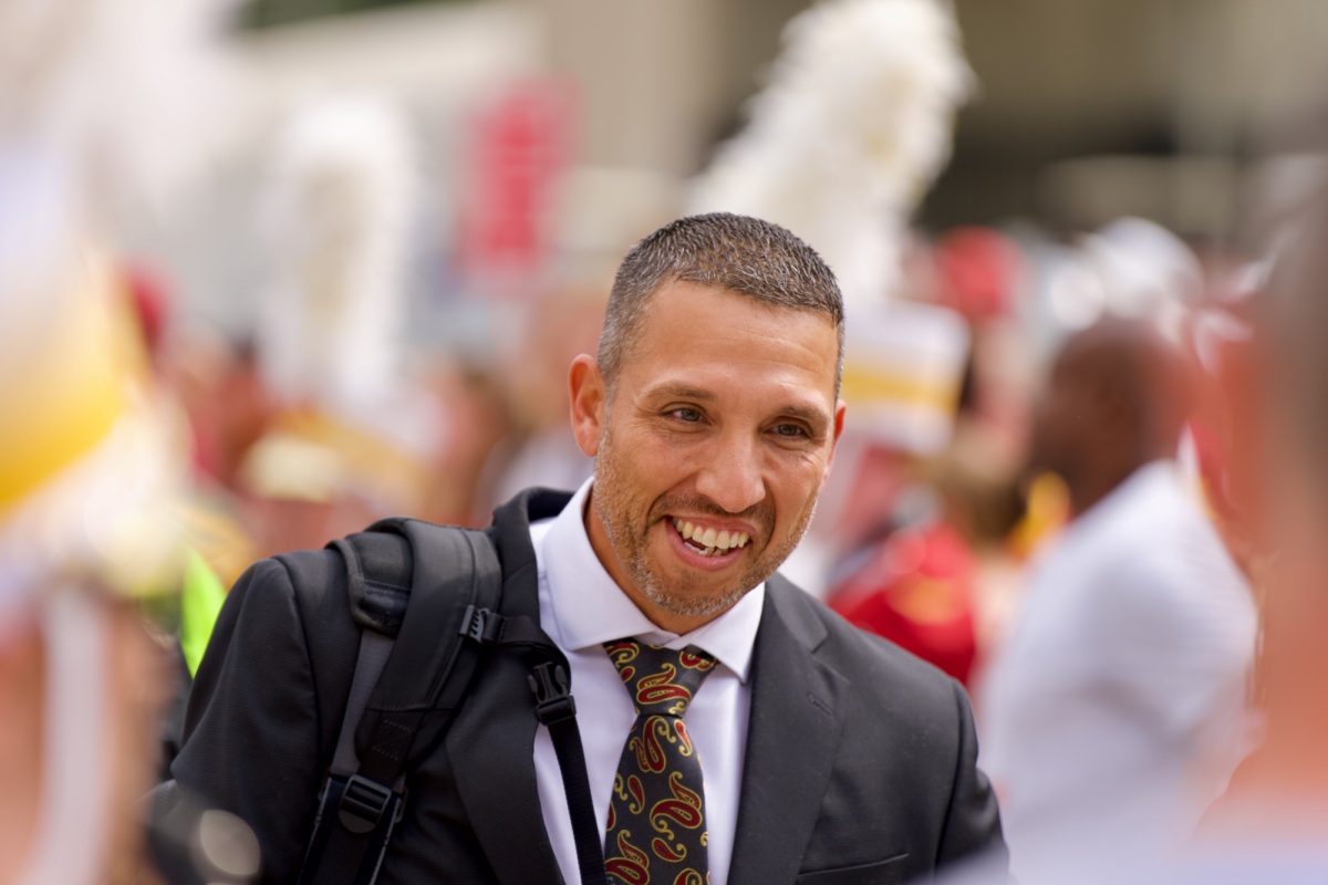 Iowa State Football head coach, Matt Campbell, smiling to the crowd during Spirit Walk against Oklahoma State out front Jack Trice Stadium on Sept, 23, 2023.