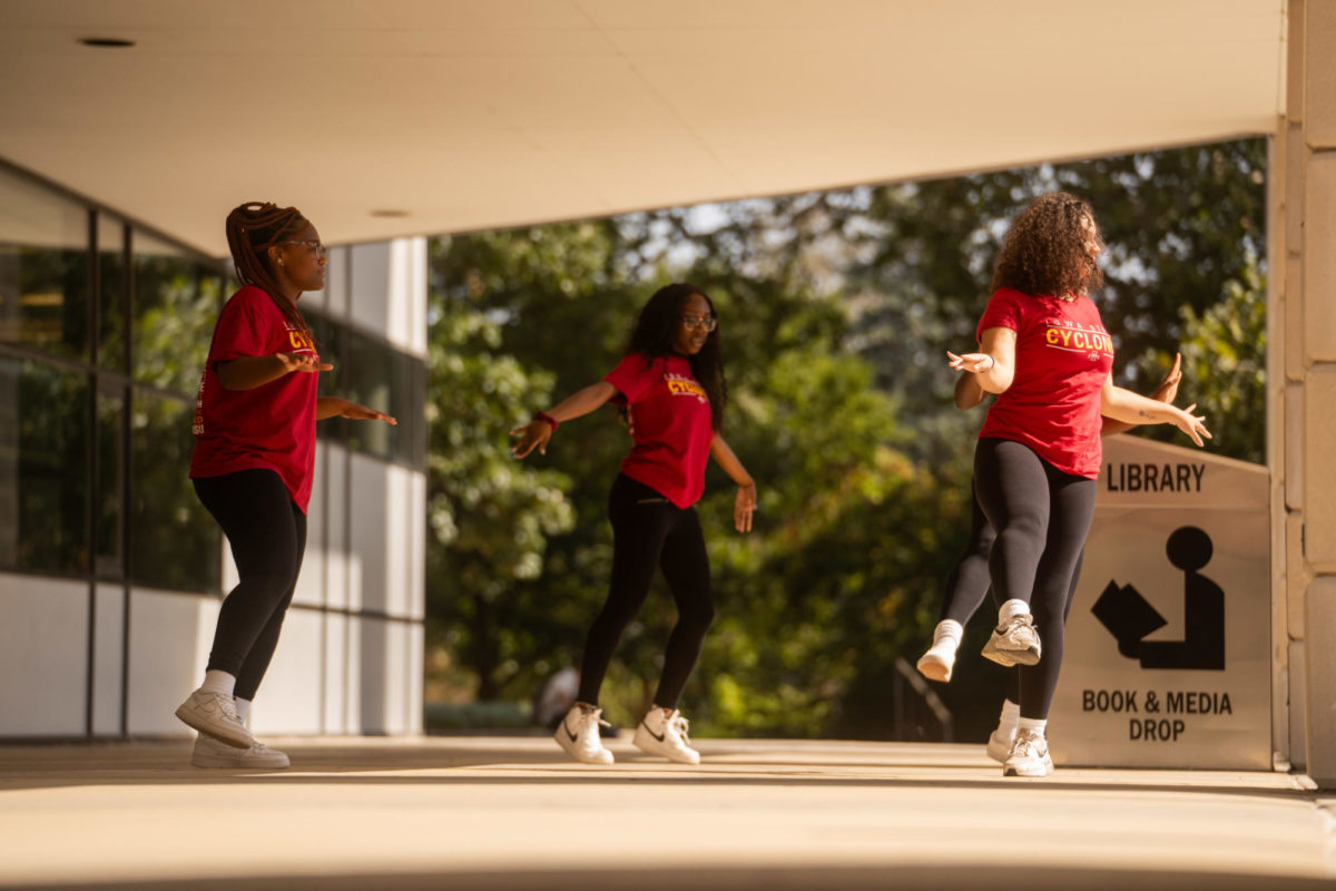The Iowa State Stormettes Dance Line perform to Boys by Lizzo at the entrance of Park Library, Oct. 2, 2023. 