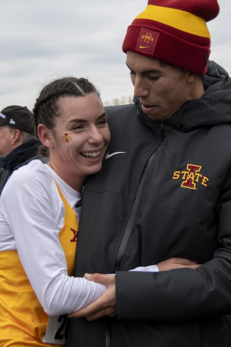 Iowa State’s Maelle Porcher, left, and Said Mechaal, right, embrace after the Big 12 Women’s Cross Country Championship on Saturday, Oct. 28, 2023, at the Iowa State University Cross Country Course in Ames, Iowa.