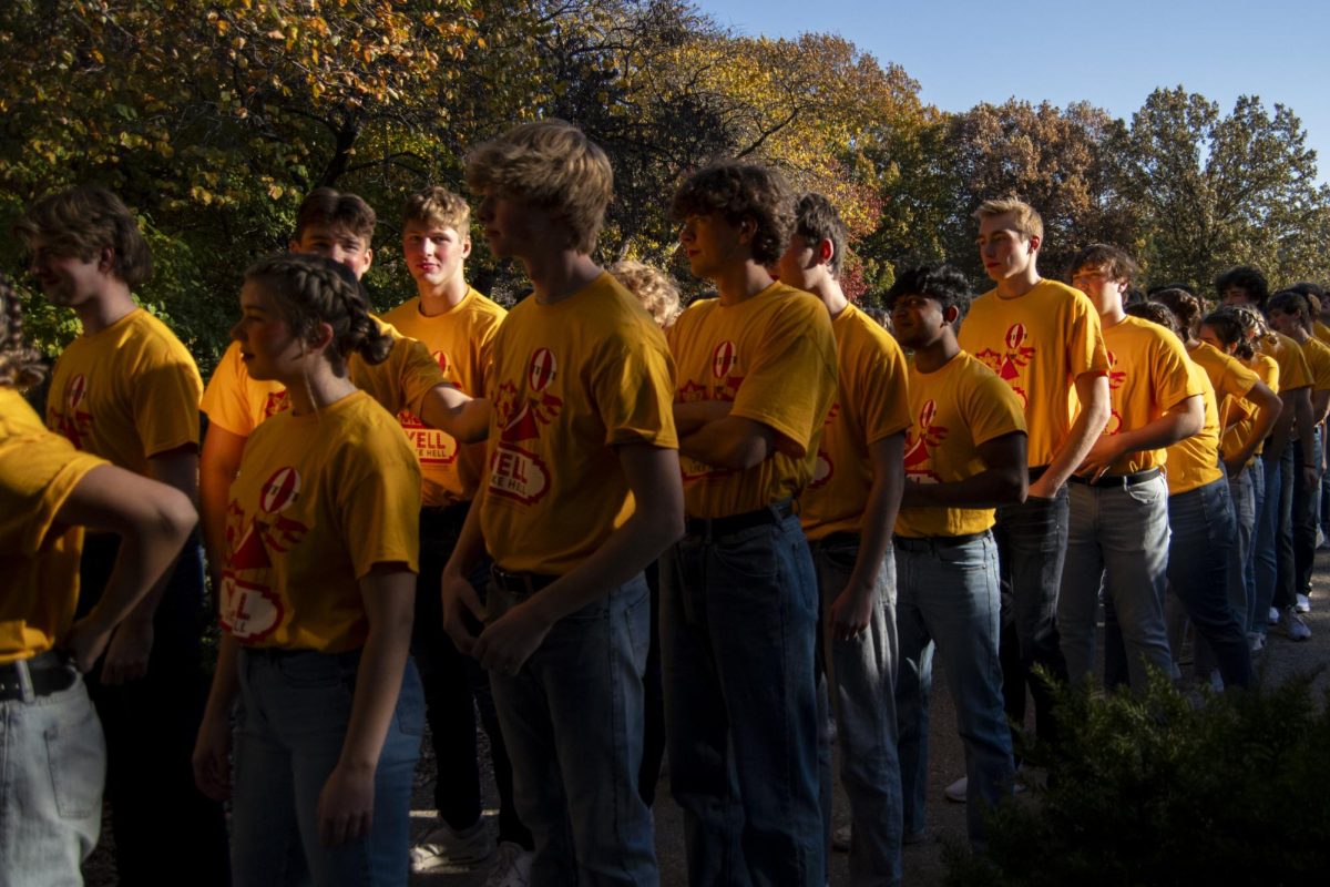 Members of the “Dr. Suess: CY-Ville” Yell Like Hell group wait to walk through the Campanile during the Yell Like Hell First Cuts on Monday, Oct. 30, 2023, at Iowa State University in Ames, Iowa.