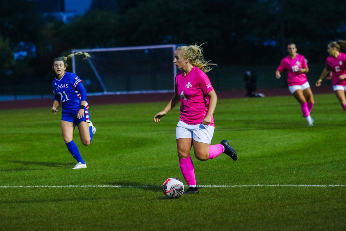 Maddie Brant taking the ball up the field during the Iowa State vs. Kansas match, Cyclone Sports Complex, Oct. 12, 2023.
