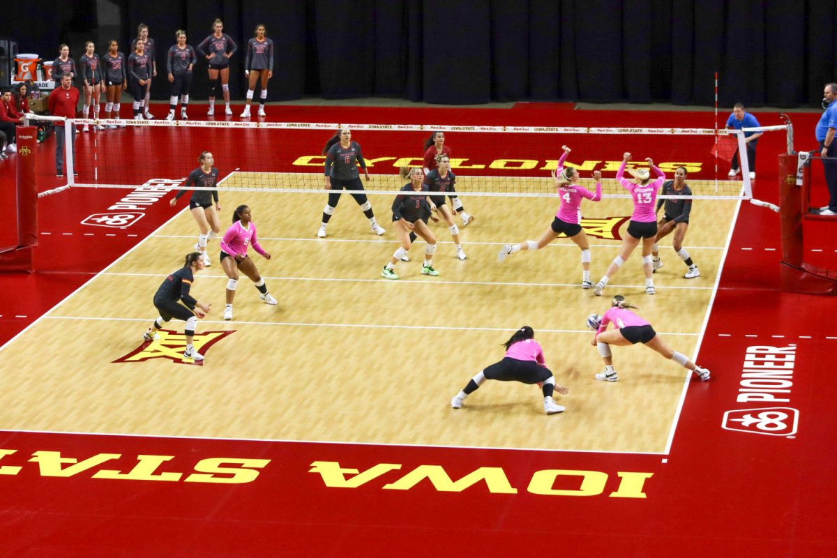 The Cyclones work to score a point at the Iowa State vs. Oklahoma volleyball game, Hilton Coliseum, Oct. 28, 2023. 