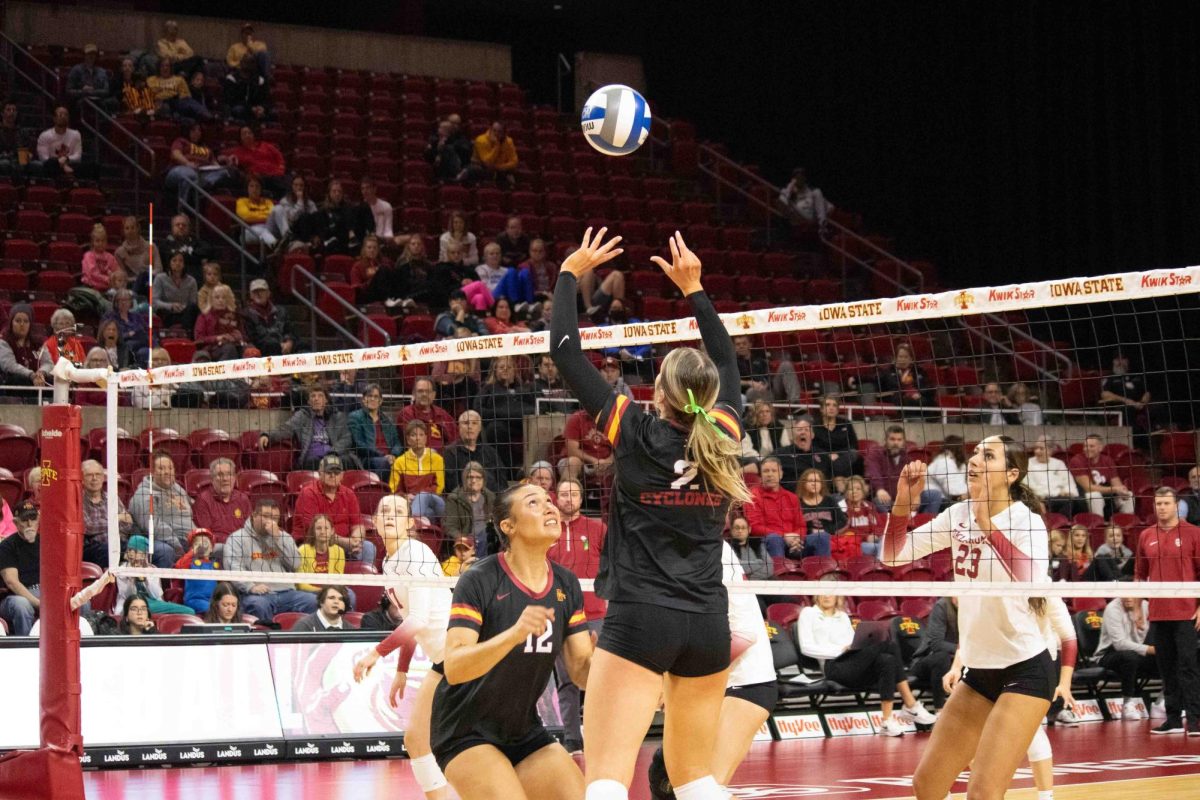 Morgan Brandt passes volleyball in the Iowa State vs. Oklahoma volleyball game