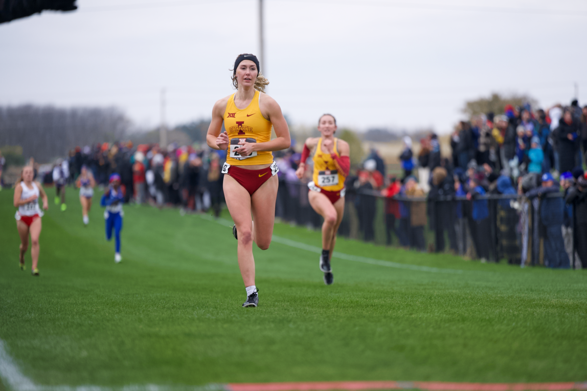 Iowa State runners Bella Heikes (Left) and Kiki Connel (Right) sprint to the finish line for the Big 12 Championship meet on Oct. 28, 2023 in Ames, Iowa.