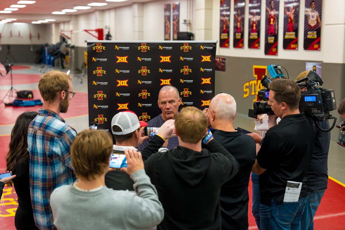 Iowa States head wrestling coach Kevin Dresser talking with the press for wrestling media day in Lied Recreation Athletic Center on Oct. 31, 2023. 