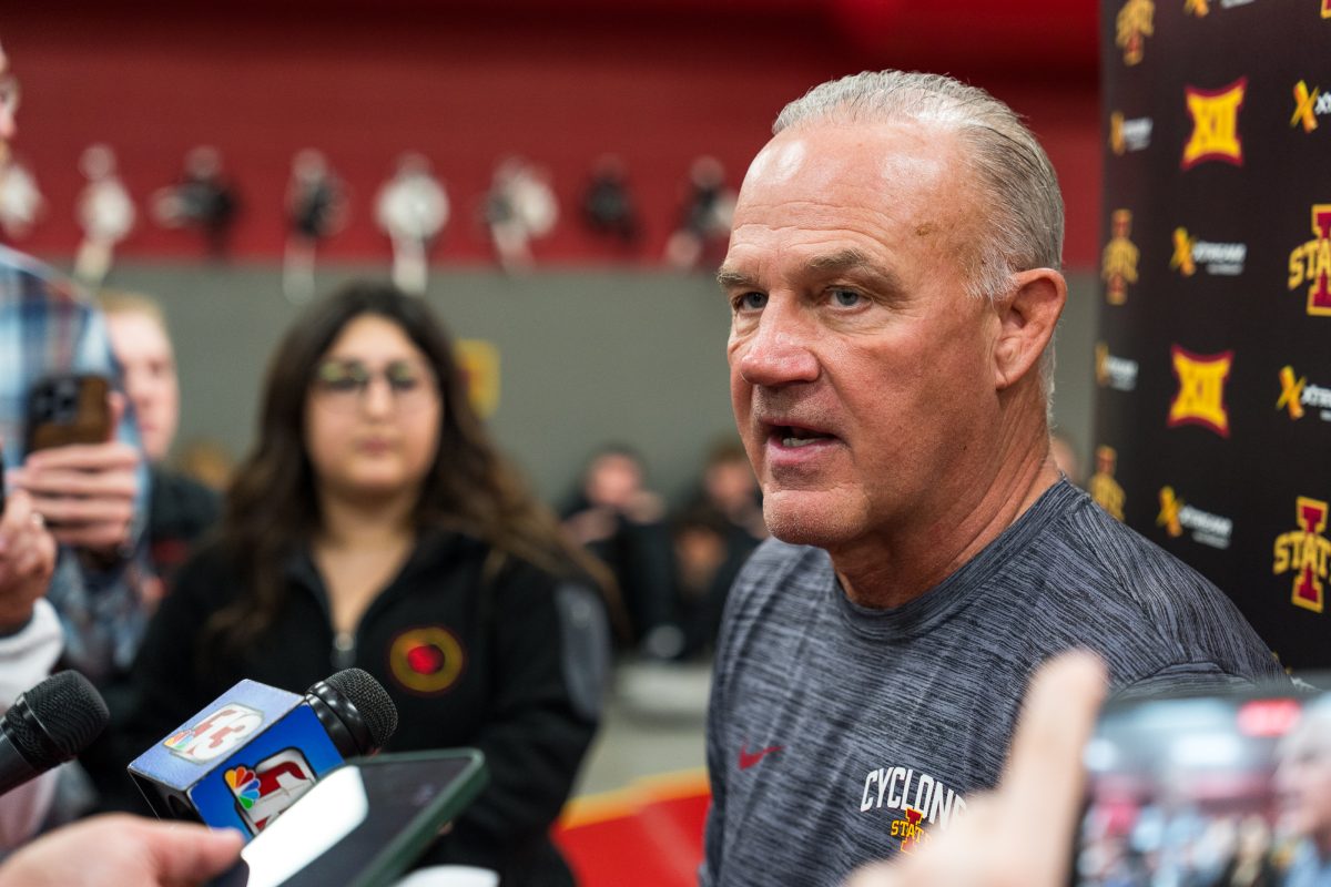 Iowa State head wrestling coach Kevin Dresser talking with the press for wrestling media day in Lied Recreation Athletic Center on Oct. 31, 2023. 
