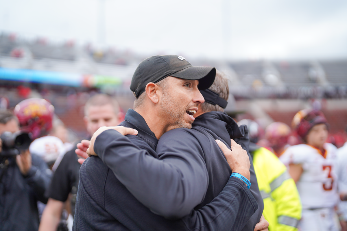 Iowa State head coach Matt Campbell greets Cincinnati head coach Scott Satterfield after a Cyclone victory at Nippert Stadium in Cincinnati on Saturday, Oct. 14, 2023.