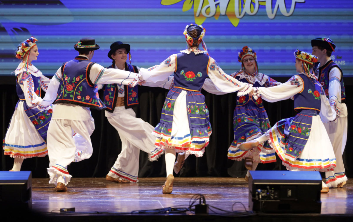 Members of the Cheremosh Ukrainian Dance Ensemble perform during the Sunflower Show hosted by Iowans for Ukrainians at the Ames City Auditorium on Oct. 14, 2023.