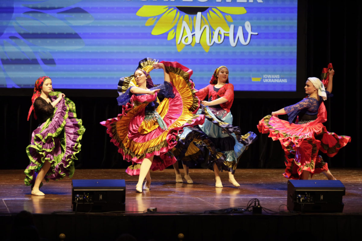 Members of the Cheremosh Ukrainian Dance Ensemble perform during the Sunflower Show hosted by Iowans for Ukrainians at the Ames City Auditorium on Oct. 14, 2023.