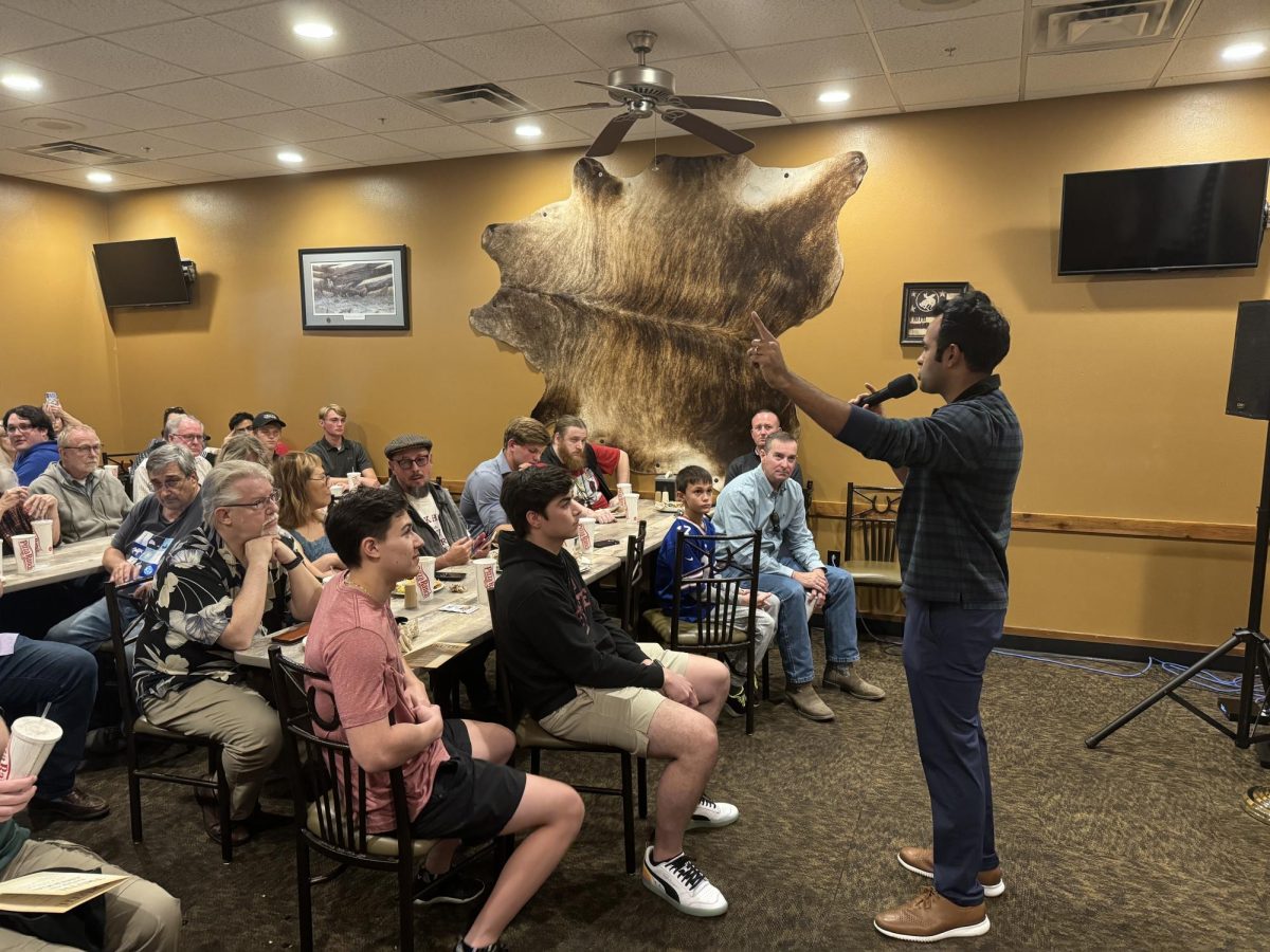 Republican presidential candidate Vivek Ramaswamy speaks to event attendees during his campaign stop at the Ames Pizza Ranch on Oct. 23, 2023.