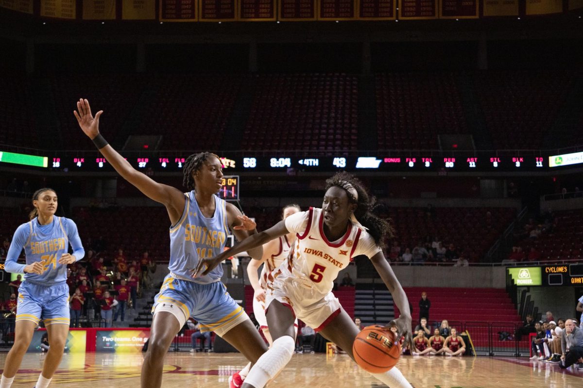 Nyamer Diew tries to get past a defender during the Iowa State vs Southern Womens Basketball Game, Hilton Coliseum, Nov. 20, 2023.