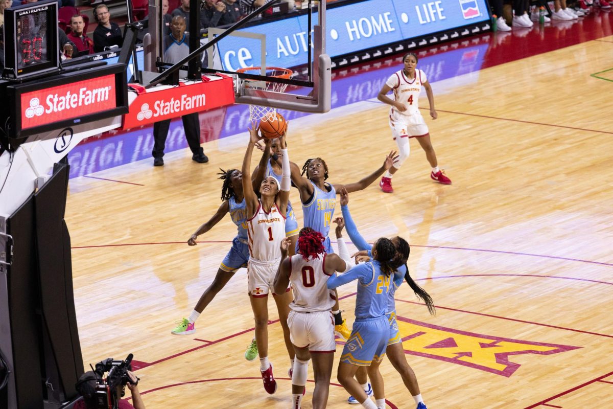 Jalynn+Bristow+fights+defenders+while+attempting+a+layup+during+the+Iowa+State+vs+Southern+Womens+Basketball+Game%2C+Hilton+Coliseum%2C+Nov.+20%2C+2023.