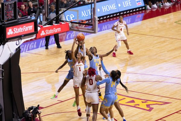 Jalynn Bristow fights defenders while attempting a layup during the Iowa State vs Southern Womens Basketball Game, Hilton Coliseum, Nov. 20, 2023.