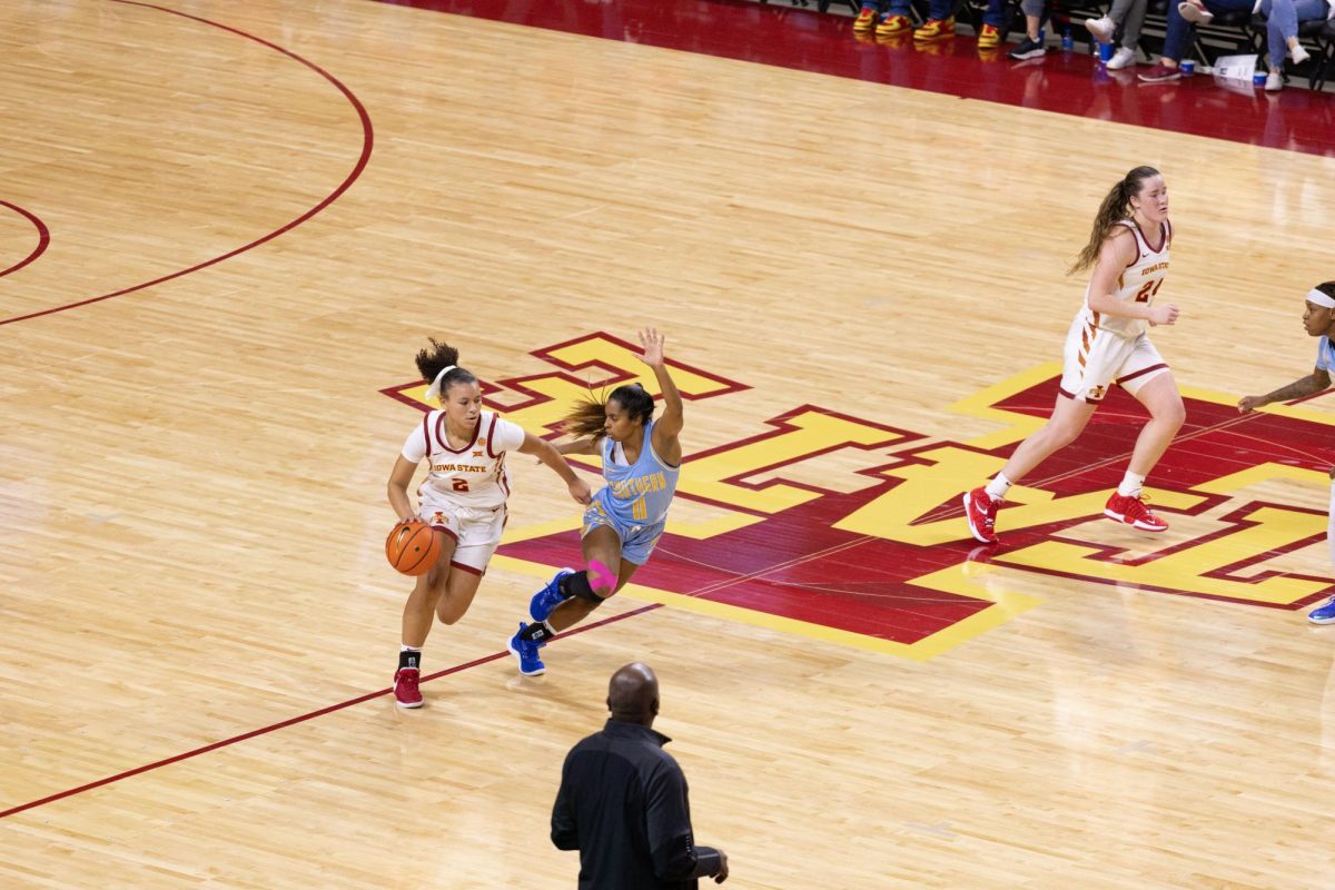 Arianna Jackson Dribbles the ball up-court during the Iowa State vs Southern Womens Basketball Game, Hilton Coliseum, Nov. 20, 2023.