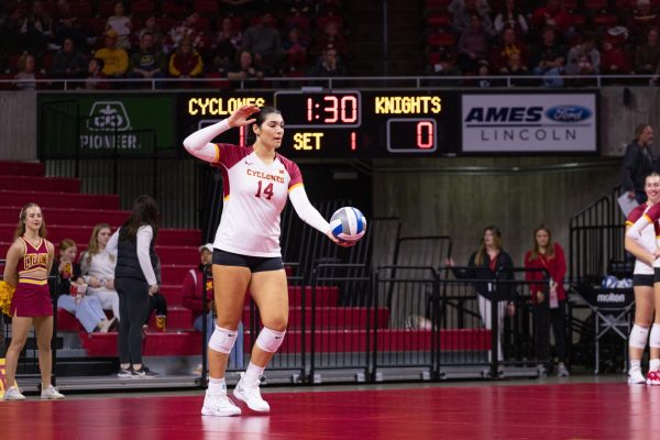 Nayeli Gonzalez prepares to serve the ball during the Iowa State vs. University of Central Florida Volleyball Game, Hilton Coliseum, Nov. 22, 2023.