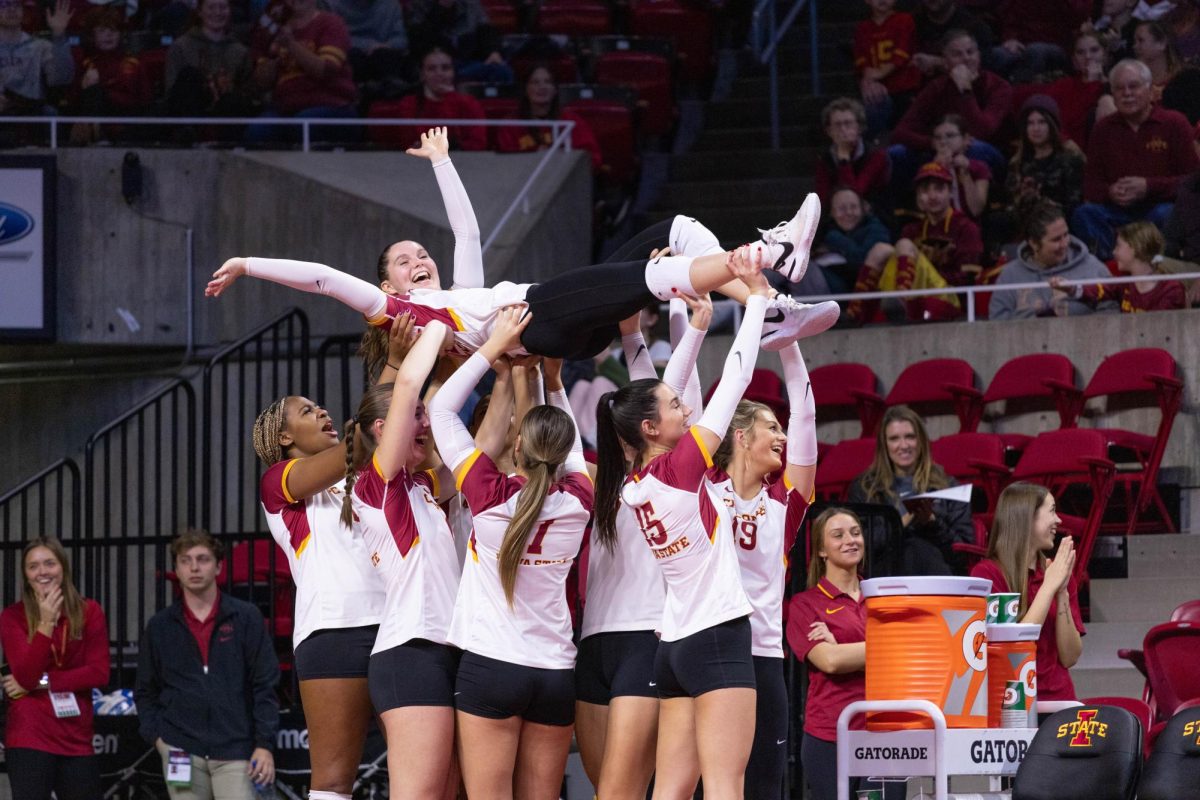 Cyclones+carry+teammate+in+celebration+during+the+Iowa+State+vs.+University+of+Central+Florida+Volleyball+Game%2C+Hilton+Coliseum%2C+Nov.+22%2C+2023.