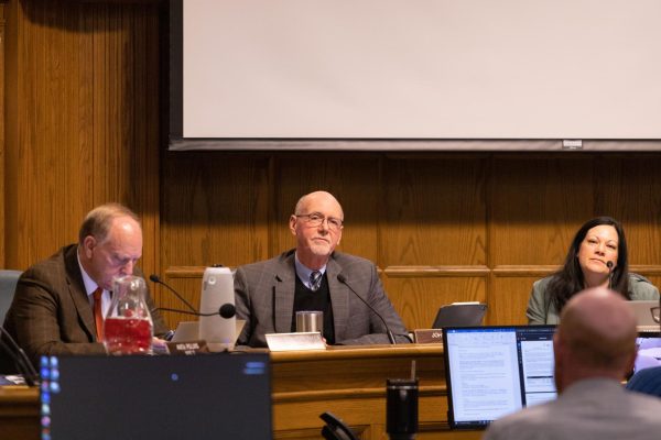 Ames Mayor John Haila listens to a presentation during City Council Meeting, Nov. 28, 2023.
