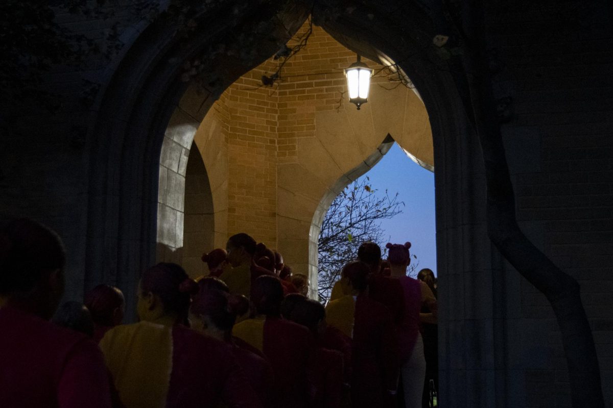 Members of “The Greatest ShowCY” Yell Like Hell group walk through the arches of the Campanile during the Yell Like Hell Second Cuts on Wednesday, Nov. 1, 2023, at Iowa State University in Ames, Iowa.