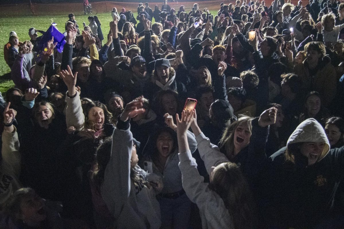 Members of the “Adventures of Sharkboy, Lavagirl, and CY” Yell Like Hell group celebrate winning first place in the Yell Like Hell competition during the Homecoming Awards Ceremony on Friday, Nov. 3, 2023, at Iowa State University in Ames, Iowa.
