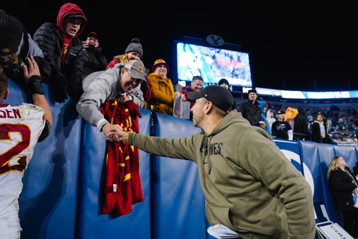 Head Coach Matt Campbell shakes hands with Iowa State fans after defeating BYU 45-13. LaVell Edwards Stadium, Provo, Utah, Nov. 11, 2023.