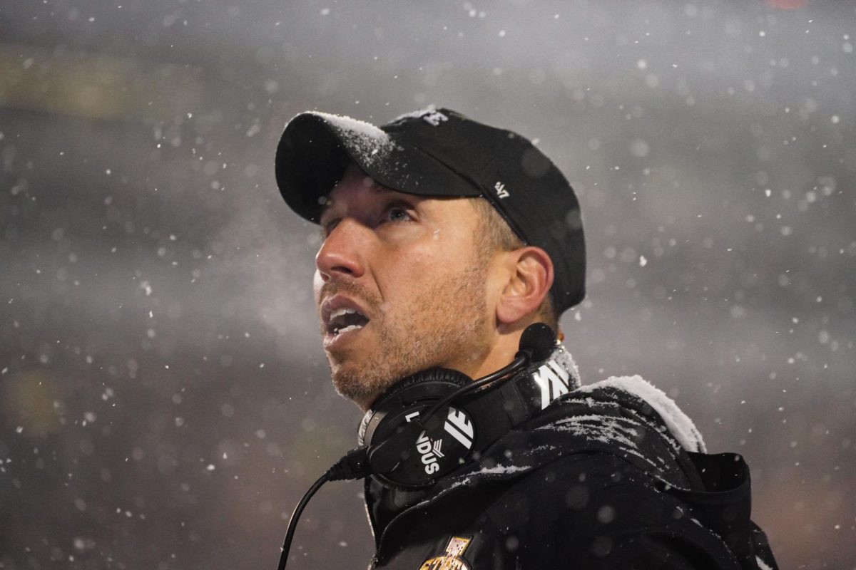 Head coach Matt Campbell watches a replay on the video board after a flag was put on Iowa State during the Iowa State vs. Kansas State football game at Bill Snyder Family Stadium on Nov. 25, 2023 in Manhattan, Kansas.