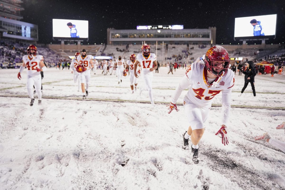 Caden Matson runs to the Iowa State fan section after the 42-35 win over Kansas State at Bill Snyder Family Stadium on Nov. 25, 2023 in Manhattan, Kansas.