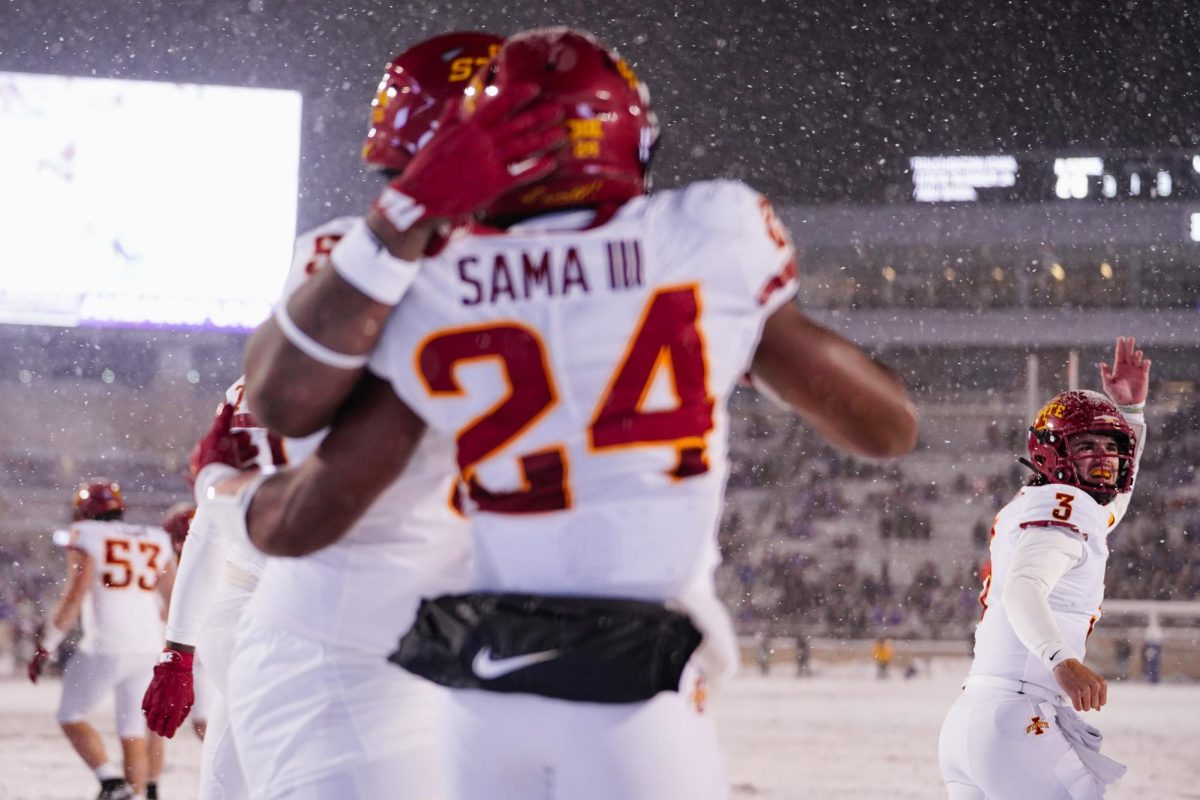 Rocco Becht(right) signals for the Iowa State fans to cheer in celebration of the second touchdown from freshman running back Abu Sama III at the Iowa State vs. Kansas State football game at Bill Snyder Family Stadium on Nov. 25, 2023 in Manhattan, KS.