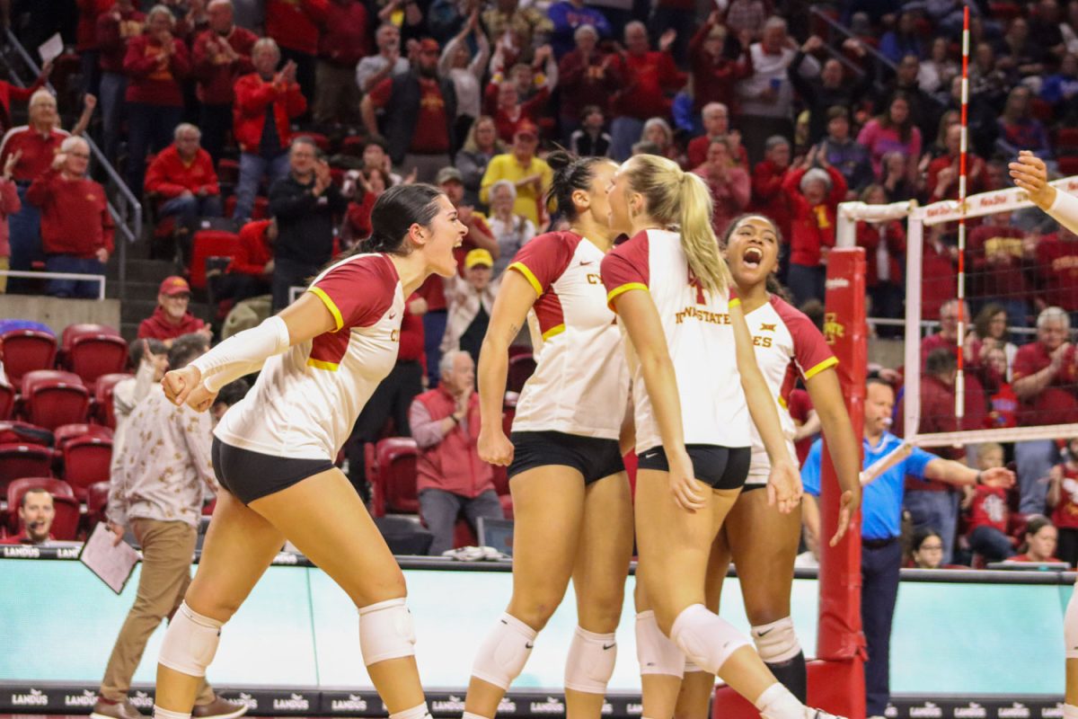 The Cyclones celebrate after they score a point against the Jayhawks at the Iowa State vs. Kansas volleyball game, Hilton Coliseum, Nov. 10, 2023. 
