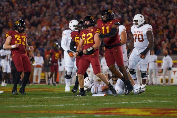 Joey Petersen of Iowa State celebrating after his tackle of Texas QB Quinn Ewers during the Iowa State vs. Texas football game on Nov. 18, 2023 in Jack Trice Stadium.