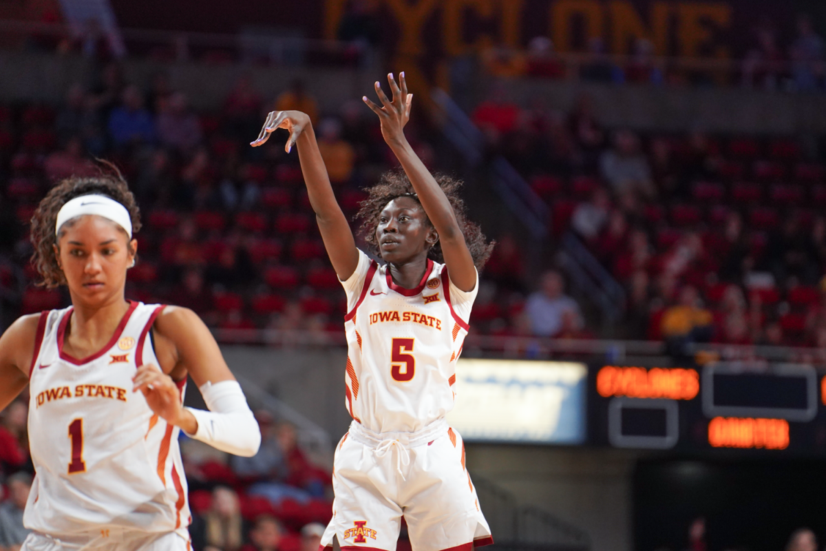 Nyamer Diew scores a three from the top of the key in the home opener against Butler at Hilton Coliseum on Nov. 6, 2023.