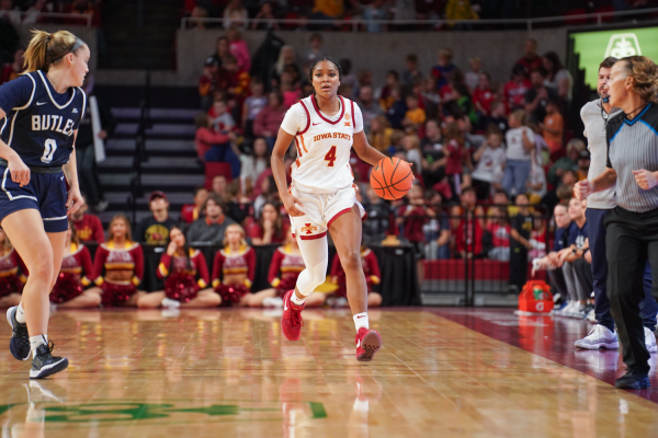 Shantavia Dawkins brings the ball up the court during the home opener against Butler at Hilton Coliseum on Nov. 6, 2023.