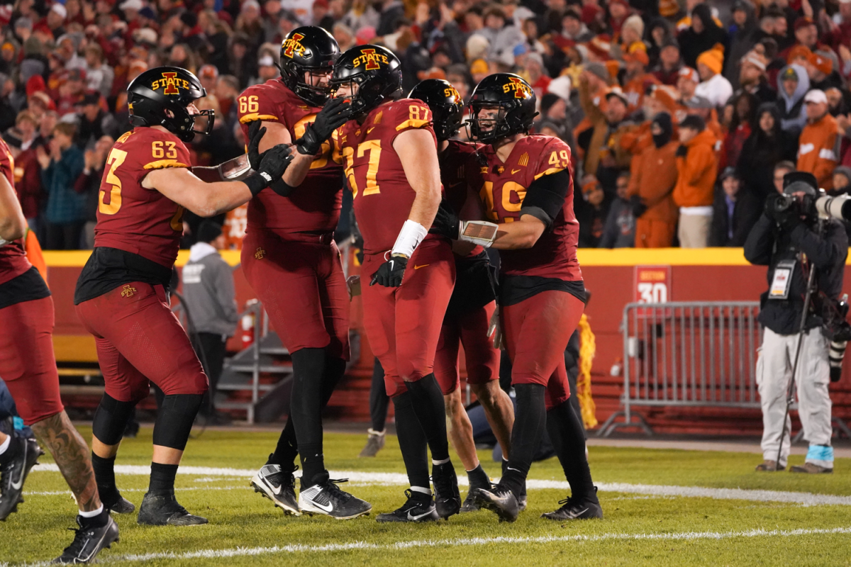 Easton Dean celebrates after he scores on a 4th & 1 attempt for 66 yards against Texas at Jack Trice Stadium on Nov. 18, 2023.