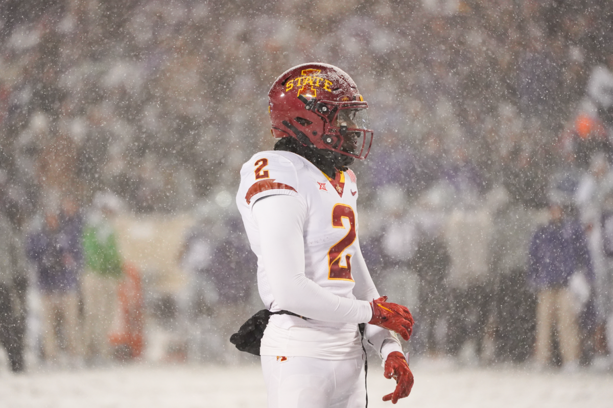 T.J. Tampa adjusts his gloves during the Iowa State vs. Kansas State football game at Bill Snyder Family Stadium on Nov. 25, 2023 in Manhattan, KS.