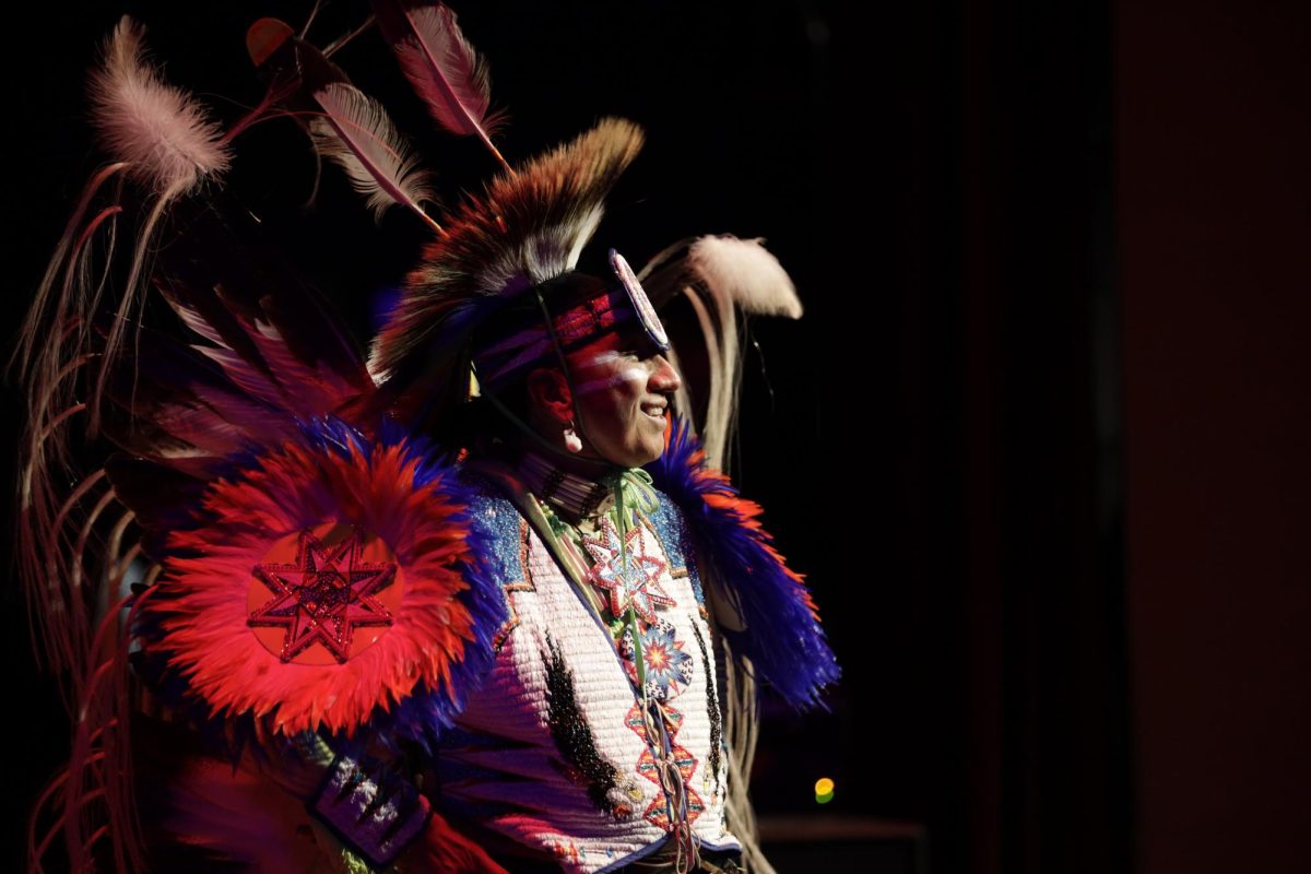 Native American Storyteller and Fancy Dancer, Larry Yazzie, finishes his performance in the Great Hall of the Memorial Union on Thursday, Nov. 30, 2023. Yazzie is a member of the Meskwaki Nation. Located near Tama, it is the only federally recognized tribe in Iowa.