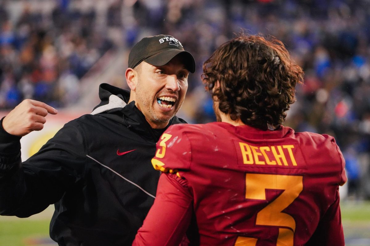 Matt+Campbell+speaks+with+Rocco+Becht+during+the+third+quarter+of+the+Iowa+State+vs.+Memphis+2023+AutoZone+Liberty+Bowl%2C+Simmons+Bank+Liberty+Stadium%2C+Dec.+29.+2023.