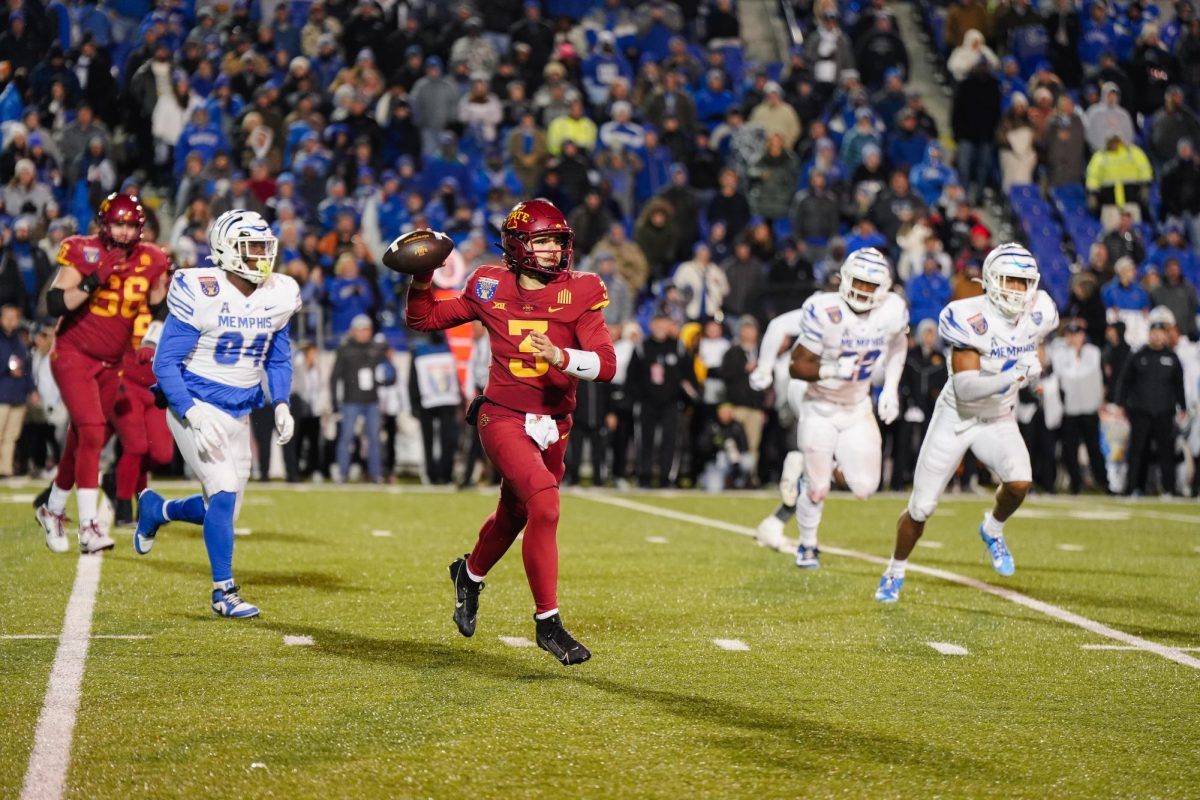 Rocco Becht throws the ball out of bounds during a scramble in the fourth quarter of the Iowa State vs. Memphis 2023 AutoZone Liberty Bowl, Simmons Bank Liberty Stadium, Dec. 29. 2023.