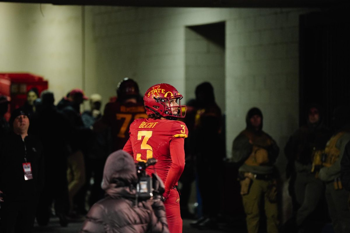 Redshirt freshman quarterback Rocco Becht looks back at the University of Memphis football team celebrating their 26-36 win over Iowa State in the Iowa State vs. Memphis 2023 AutoZone Liberty Bowl, Simmons Bank Liberty Stadium, Dec. 29. 2023.