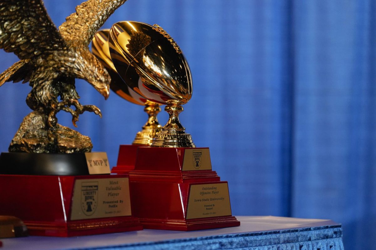 Trophies are displayed in the post-game press conference of the Iowa State vs. Memphis 2023 AutoZone Liberty Bowl, Simmons Bank Liberty Stadium, Dec. 29. 2023.